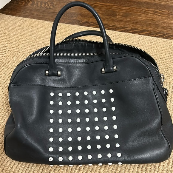 Good condition. Pockets on the inside and outside. Fits lot of stuff inside. - Picture 1 of 5